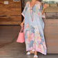 Vestido largo holgado con estampado floral y media manga