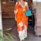 Vestido largo holgado con estampado floral y media manga