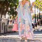 Vestido largo holgado con estampado floral y media manga