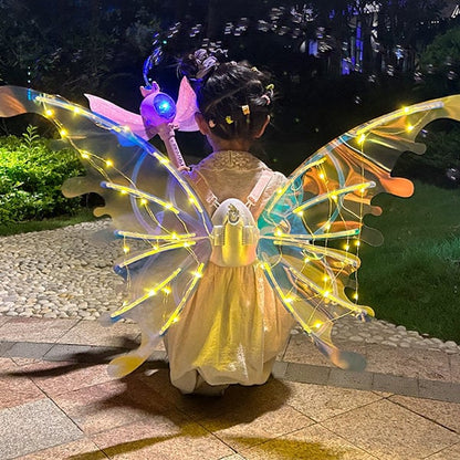 ✨Mira, viene el duendeAlas de mariposa eléctricas con luces musicales