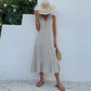 Vestido amplio con dobladillo a capas y detalle de botones